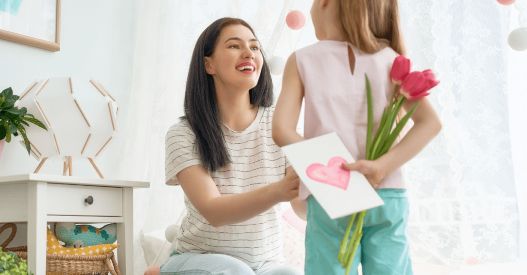 10 Heartwarming Mom Birthday Card Ideas to Show Your Love 20 girl bringing flowers and birthday card to mom